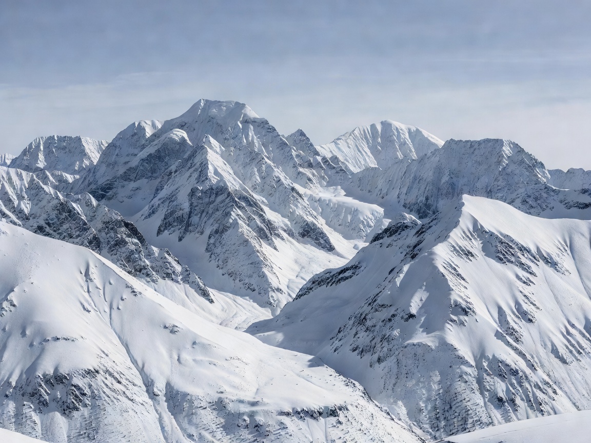 Majestic snowy mountain peaks sitting in deep stillness